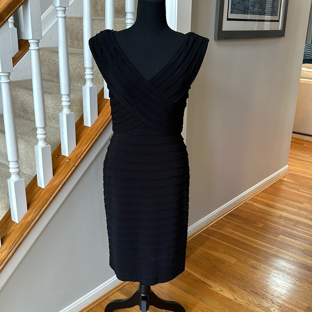 Xscape dress black - size 10. Shows off all the curves!